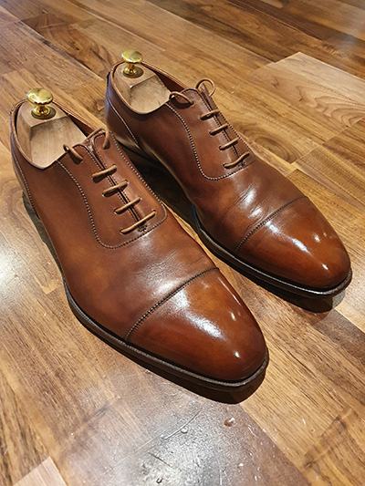 Pair of brown Edward Green derby shoes after a shoeshine